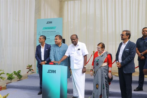 Union ministers press the launch button at the inauguration of the DICT swap station